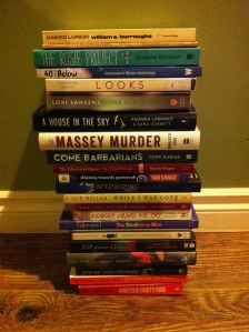 Matthew's stack. Pretty jealous that he's going to be reading The Girls soon.