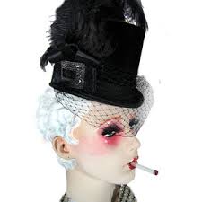 Google Dickens + Gothic and you will mostly get corsets and little hats. This is a family show, so here's a hat.